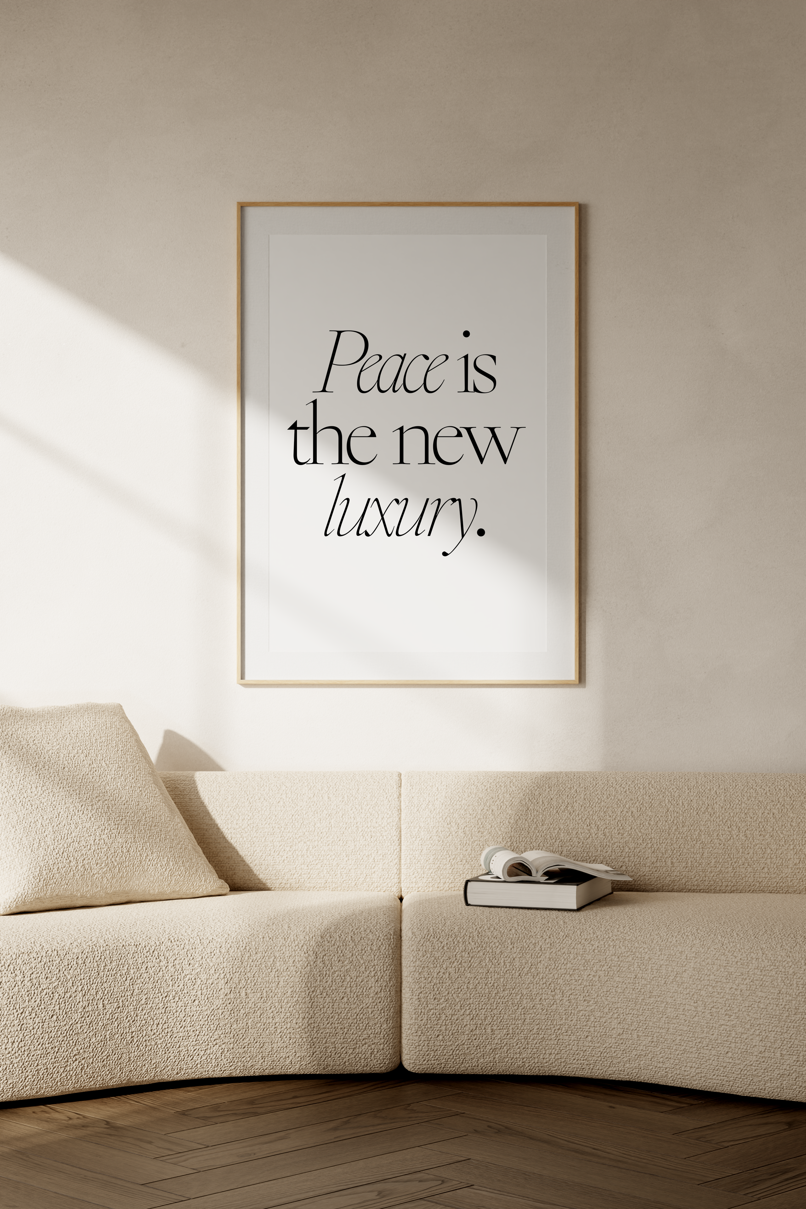 Peace is the New Luxury black and white minimalist quote print framed in living room by Studio Heavenly