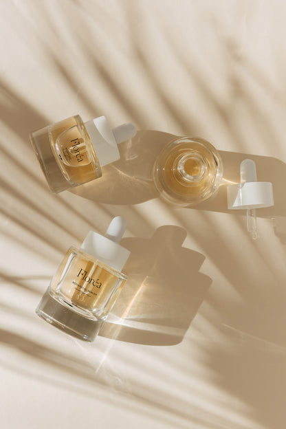 Three Glass Dropper Bottles Mockup